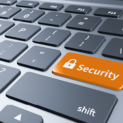 Ansicht einer Computertastatur mit einer blauen Taste, auf der ein Schloss-Symbol und das Wort &bdquo;Security&ldquo; zu sehen sind